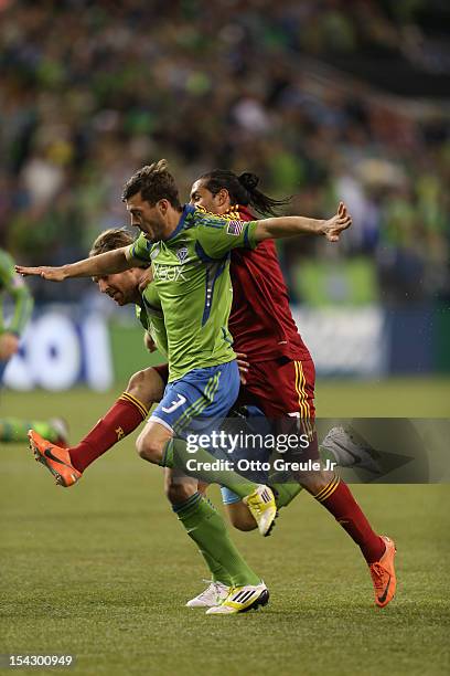 Brad Evans, and Jeff Parke of the Seattle Sounders FC battle Fabian Esp’ndola of Real Salt Lake at CenturyLink Field on October 17, 2012 in Seattle,...