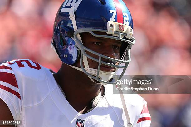 Defensive end Osi Umenyiora of the New York Giants warms up for the game with the San Francisco 49ers at Candlestick Park on October 14, 2012 in San...