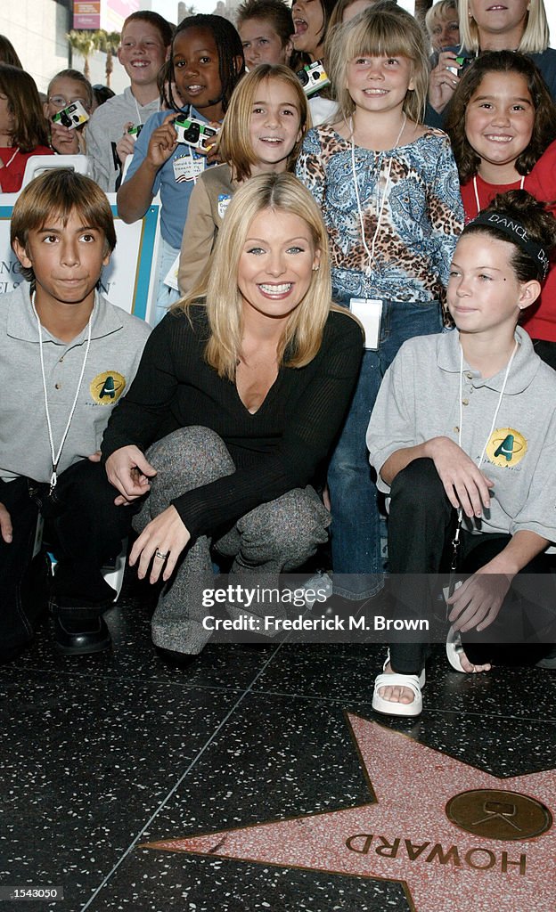 Angle Ripa Television host Kelly Ripa attends the 2002 Angel Soft Angels in ...