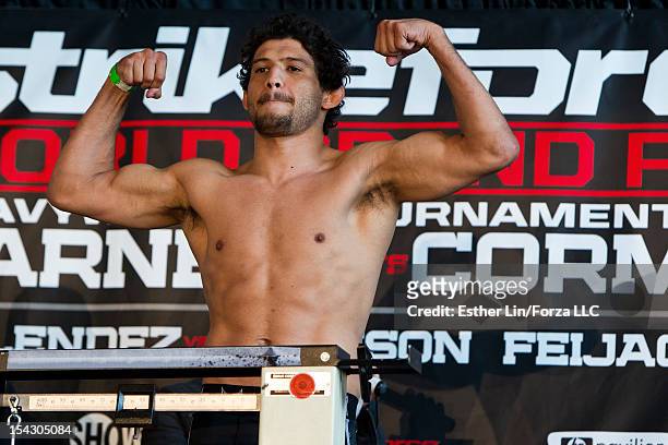 Gilbert Melendez weighs-in during the Strikeforce weigh-ins at HP Pavilion on May 18, 2012 in San Jose, California.