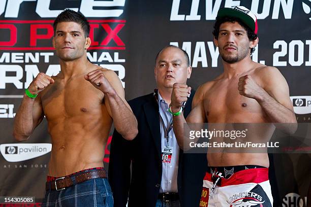 Josh Thompson poses with Gilbert Melendez during the Strikeforce weigh-ins at HP Pavilion on May 18, 2012 in San Jose, California.