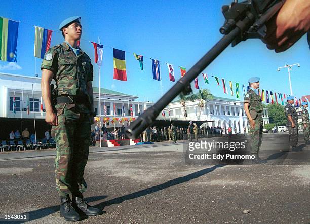 Peacekeeping soldiers stand during a farewell ceremony May 17, 2002 in Dili, East Timor. The country will formally declare independence on May 20,...