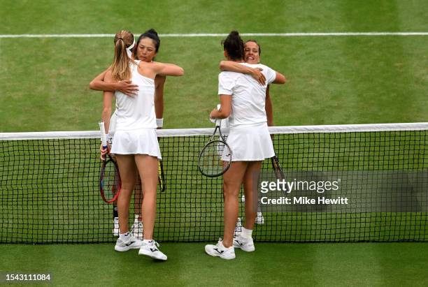 Su-Wei Hsieh of Chinese Taipei and Barbora Strycova of Czech Republic interact with Sara Sorribes Tormo of Spain and Marie Bouzkova of Czech Republic...