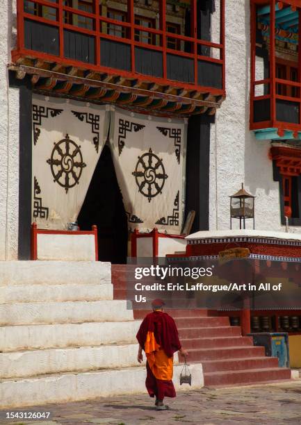 Lama carrying insence burner in Hemis monastery, Ladakh, Hemis, India on June 17, 2023 in Hemis, India.