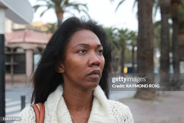 Diane Mistler, a Madagascan woman who allegedly tricked one of her many lovers into killing her husband with a fishing harpoon arrives at Perpignan's...