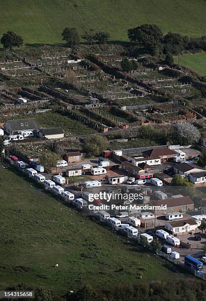 Caravans line an access road to the now empty Dale Farm travellers site on October 17, 2012 near Basildon, England. A year after local authorities...