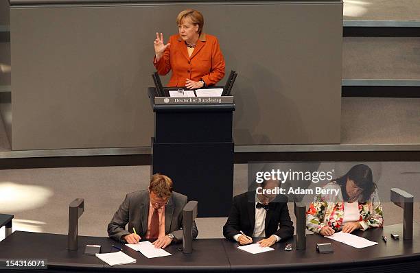 German Chancellor Angela Merkel gives a government declaration in the Bundestag prior to a European Council meeting in Brussels on October 18, 2012...