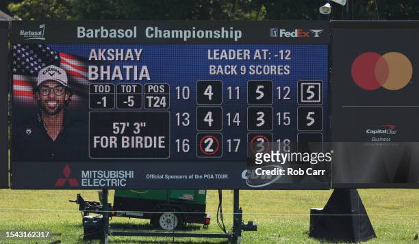 The leaderboard showing Akshay Bhatia of the United States on the 18th green during the second round of the Barbasol Championship at Keene Trace Golf...