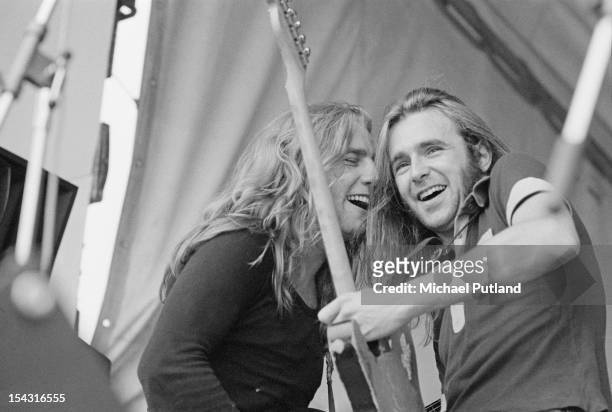 Guitarists Rick Parfitt and Francis Rossi performing with English rock group Status Quo at the Reading Festival, Reading, Berkshire, 13th August 1972.