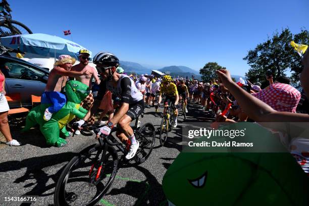 Adam Yates of United Kingdom and UAE Team Emirates and Jonas Vingegaard of Denmark and Team Jumbo-Visma - Yellow Leader Jersey compete in the chase...