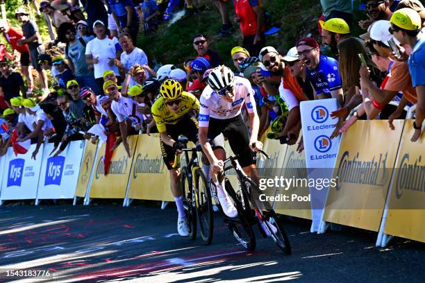 Tadej Pogacar of Slovenia and UAE Team Emirates - White Best Young Rider Jersey attacks to Jonas Vingegaard of Denmark and Team Jumbo-Visma - Yellow...