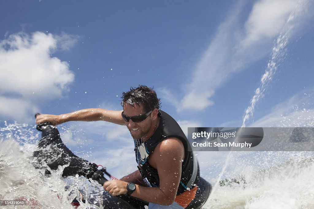 Man jet skiing in the ocean