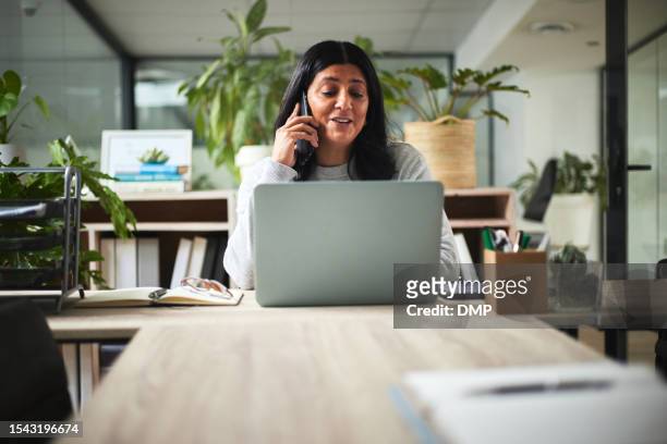 business woman, phone call and laptop in office with networking and conversation. computer, employee and female person with mobile discussion for online marketing consultation at company and desk - admin assistant stock pictures, royalty-free photos & images
