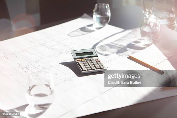 calculator in modern office. - calculator stock pictures, royalty-free photos & images