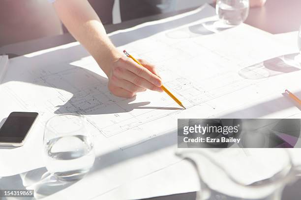 businessman drawing and making plans. - architect stockfoto's en -beelden