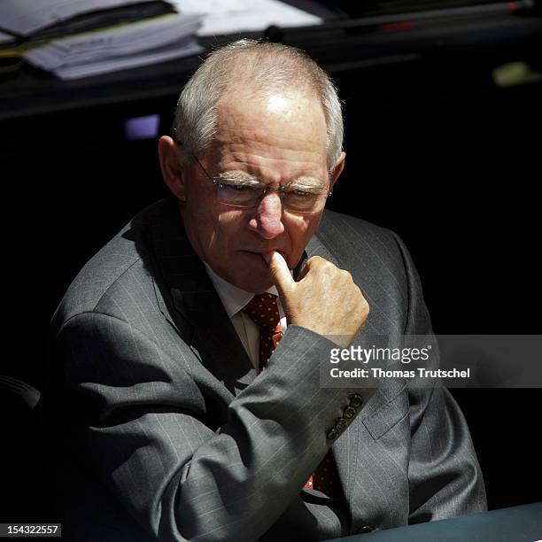 German Finance Minister Wolfgang Schaeuble sit at Reichstag, the seat of the German Parliament , on October 18, 2012 in Berlin, Germany. European...