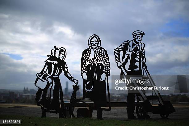 New portrait bench celebrating three local icons Kitty Wilkinson, Molly Bushell and a dock worker overlooks the city of Liverpool from Everton Park...