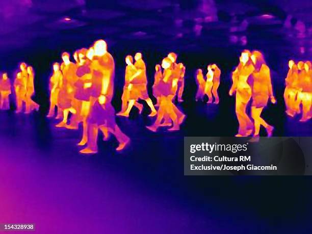 thermal view of people walking - thermal imaging stock pictures, royalty-free photos & images