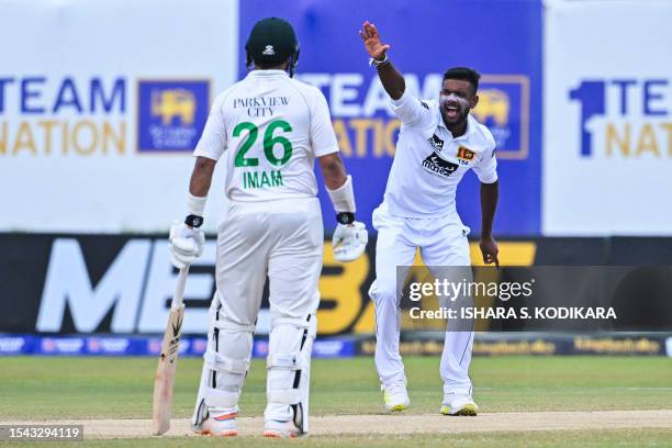 Sri Lanka's Ramesh Mendis unsuccessfully appeals for a leg before wicket decision against Pakistan's captain Babar Azam during the fifth and final...