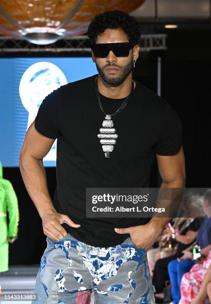 Alfonso Zayas walks in The Burning Guitars portion of The Fashion Life Tour Presents The Fashion Life Tour Miami Edition held at Hilton Miami Airport...