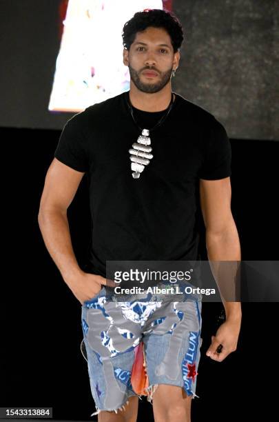Alfonso Zayas walks in The Burning Guitars portion of The Fashion Life Tour Presents The Fashion Life Tour Miami Edition held at Hilton Miami Airport...