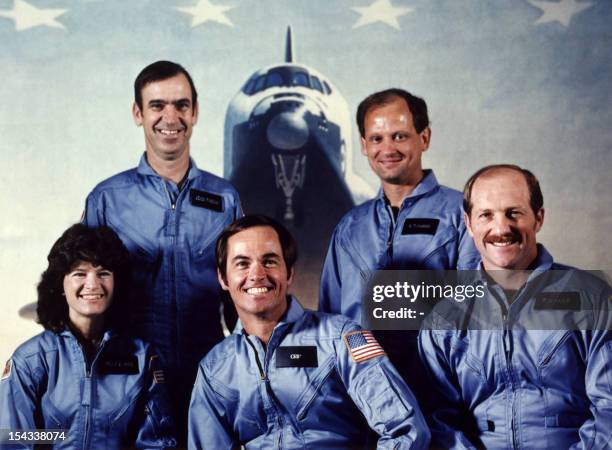 Astronaut Robert Crippen , the Space Shuttle Challenger crew commander, pose in January 1983 in Johnson Space Center, Houston, with his crewmembers,...