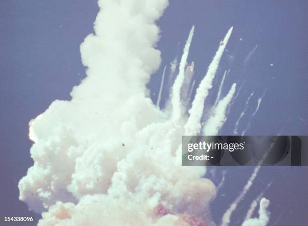 This photo released by NASA, of the 28 January 1986 explosion which destroyed the Space shuttle Challenger and killed all seven crew members 75...