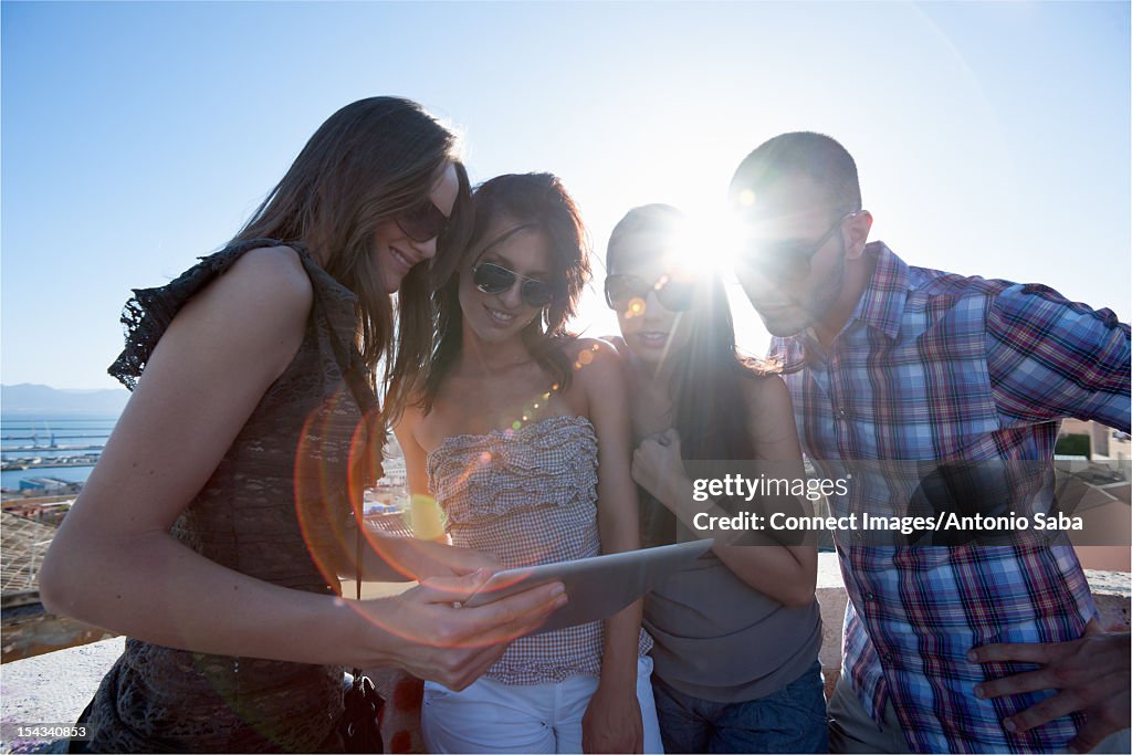 Computer System Friends Friends Using Tablet Computer Together High-Res Stock Photo - Getty Images