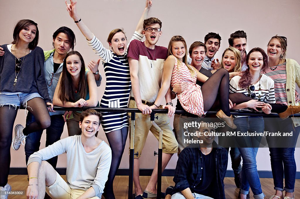 Dance students posing at barre