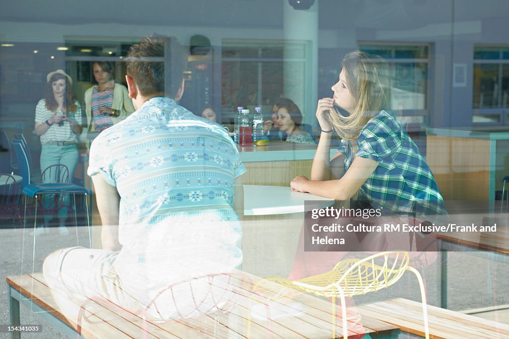 Students sitting together in cafeteria