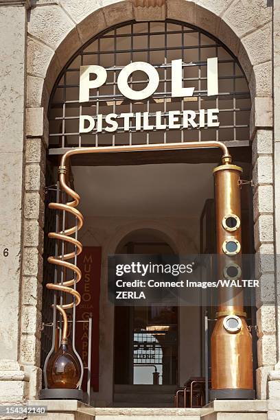 window sign for distillery - grappa foto e immagini stock