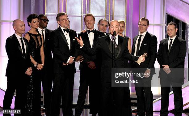 69th ANNUAL GOLDEN GLOBE AWARDS -- Pictured: Unknown, Morena Baccarin, David Harewood, producer Alex Gansa, Damian Lewis, Mandy Patinkin, producer...