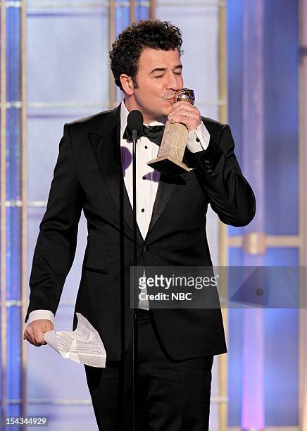 69th ANNUAL GOLDEN GLOBE AWARDS -- Pictured: Ludovic Bource accepting award for Best Original Score - Motion Picture "The Artist" on stage during the...