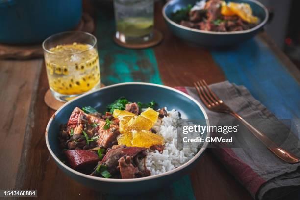 feijoada brazilian black bean chili - feijoada stock pictures, royalty-free photos & images