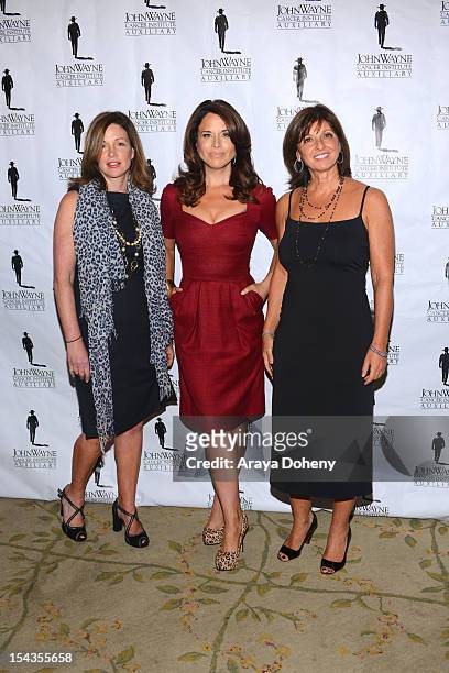 Nancy Heim, Laura Baron and Paula Pinhas arrive at the John Wayne Cancer Institute Auxiliary annual awards luncheon at Beverly Hills Hotel on October...