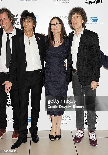 Director Brett Morgen, Ronnie Wood, Victoria Pearman and Mick Jagger attend the Gala Premiere of 'Crossfire Hurricane' during the 56th BFI London...