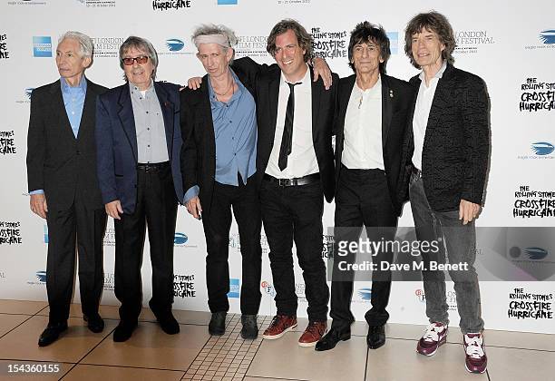 Charlie Watts, Bill Wyman, Keith Richards, director Brett Morgen, Ronnie Wood and Mick Jagger attend the Gala Premiere of 'Crossfire Hurricane'...