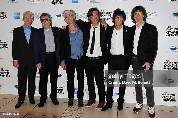 Charlie Watts, Bill Wyman, Keith Richards, director Brett Morgen, Ronnie Wood and Mick Jagger attend the Gala Premiere of 'Crossfire Hurricane'...