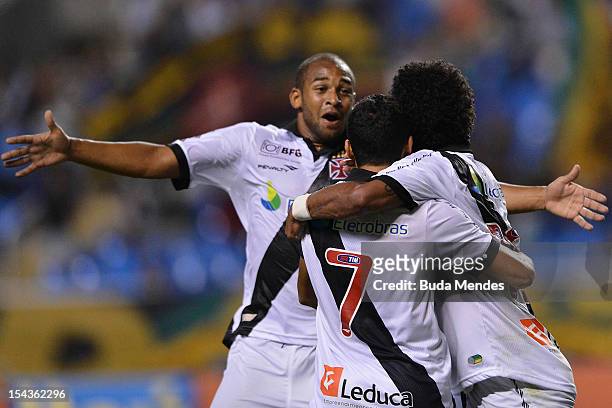Felipe Bastos , Eder and Carlos Alberto of Vasco celebrate a goal during a match between Botafogo and Vasco as part of the Brazilian Championship...