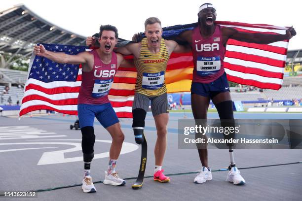 Jarryd Wallace of United States of America, Markus Rehm of Germany and Derek Loccident of United States of America celebrate after the Men's Long...