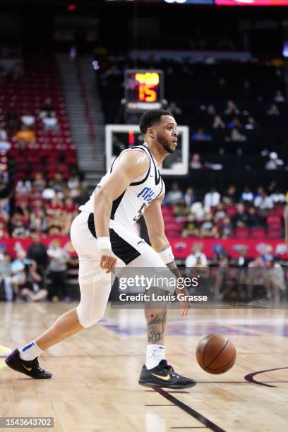 Quinndary Weatherspoon of the Orlando Magic dribbles up court in the second half of a 2023 NBA Summer League game against the Portland Trail Blazers...