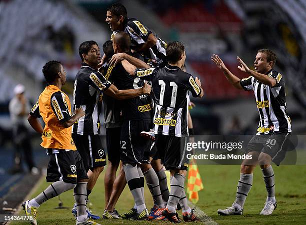 Players of Botafogo celebrate a goal during a match between Botafogo and Vasco as part of the Brazilian Championship Serie A at Engenhao stadium on...