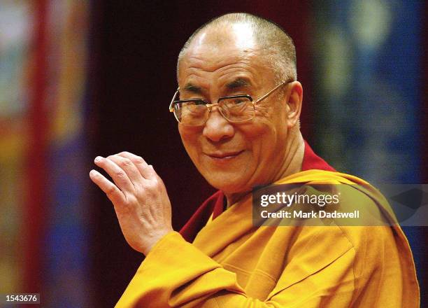 Tibetan spiritual leader, the Dalai Lama, addresses a gathering at a learning session on Atisha's "Lamp of the Path to Enlightenment" May 20, 2002 at...
