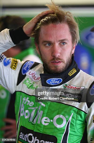 Nick Heidfeld of Germany and driver of the Bottle-O FPR Ford is seen in the pit garage after practice for the Gold Coast 600, which is round 12 of...