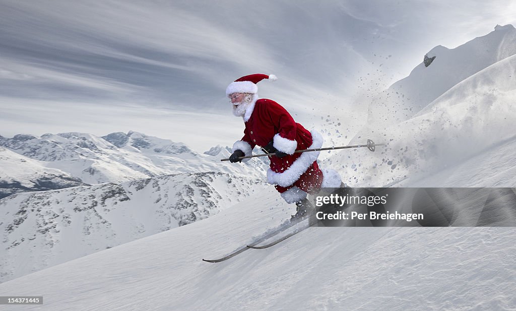 Santa Claus skiing in the big mountains