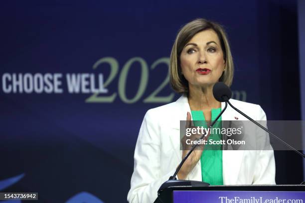 Iowa Governor Kim Reynolds speaks to guests before signing into law a bill that will ban most abortions after around six weeks of pregnancy during a...