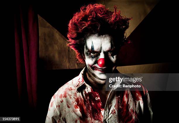 killer clown with an evil smile - circus curtains stock pictures, royalty-free photos & images