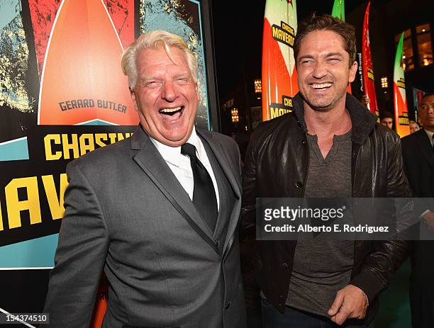 Surfer Frosty Hesson and actor Gerard Butler arrive to the premiere of 20th Century Fox's "Chasing Mavericks" on October 18, 2012 in Los Angeles,...