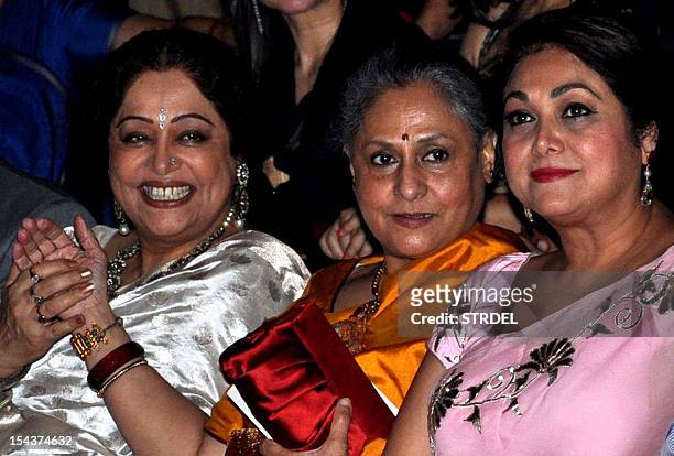 Indian Bollywood actresses Kirron Kher Jaya Bachchan and socialite Tina Ambani pose as they attend the opening ceremony for the 14th Mumbai Film...