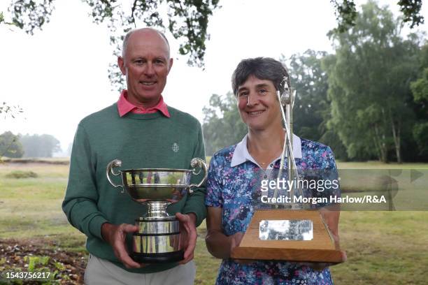 Brent Paterson of New Zealand and Jackie Foster of Bishops Stortford pose with their Trophies following the final round of the R&A Men's and Women's...
